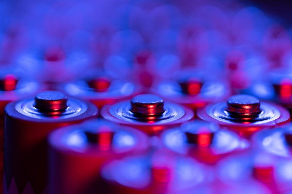 closeup-positive-ends-discharged-batteries-aa-sizes-macro-shot-selective-focus-used-battery
