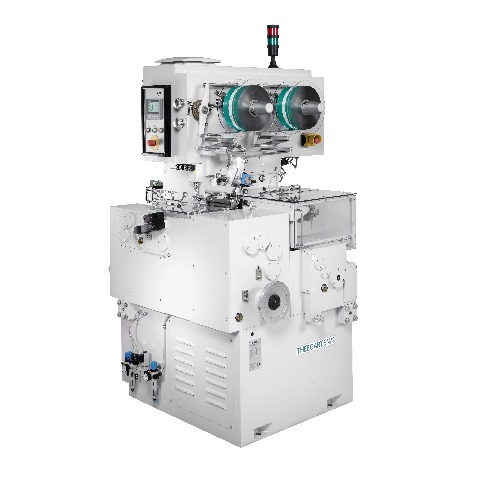 System formowania i pakowania miękkich karmelków z paskiem komiksowym